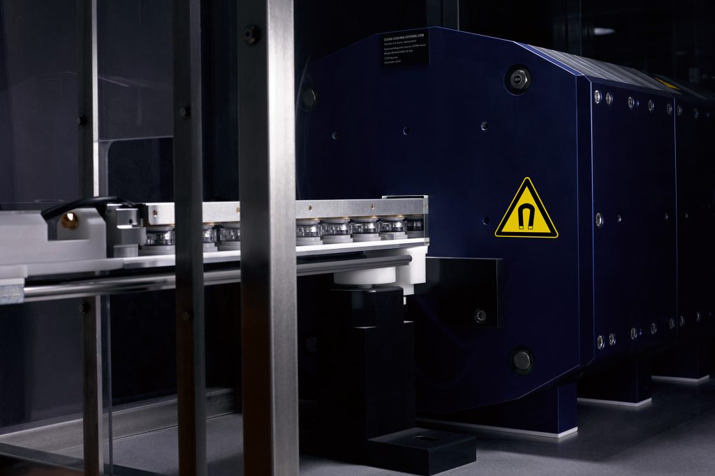 OMEGA watches about to be tested in a machine of electricity