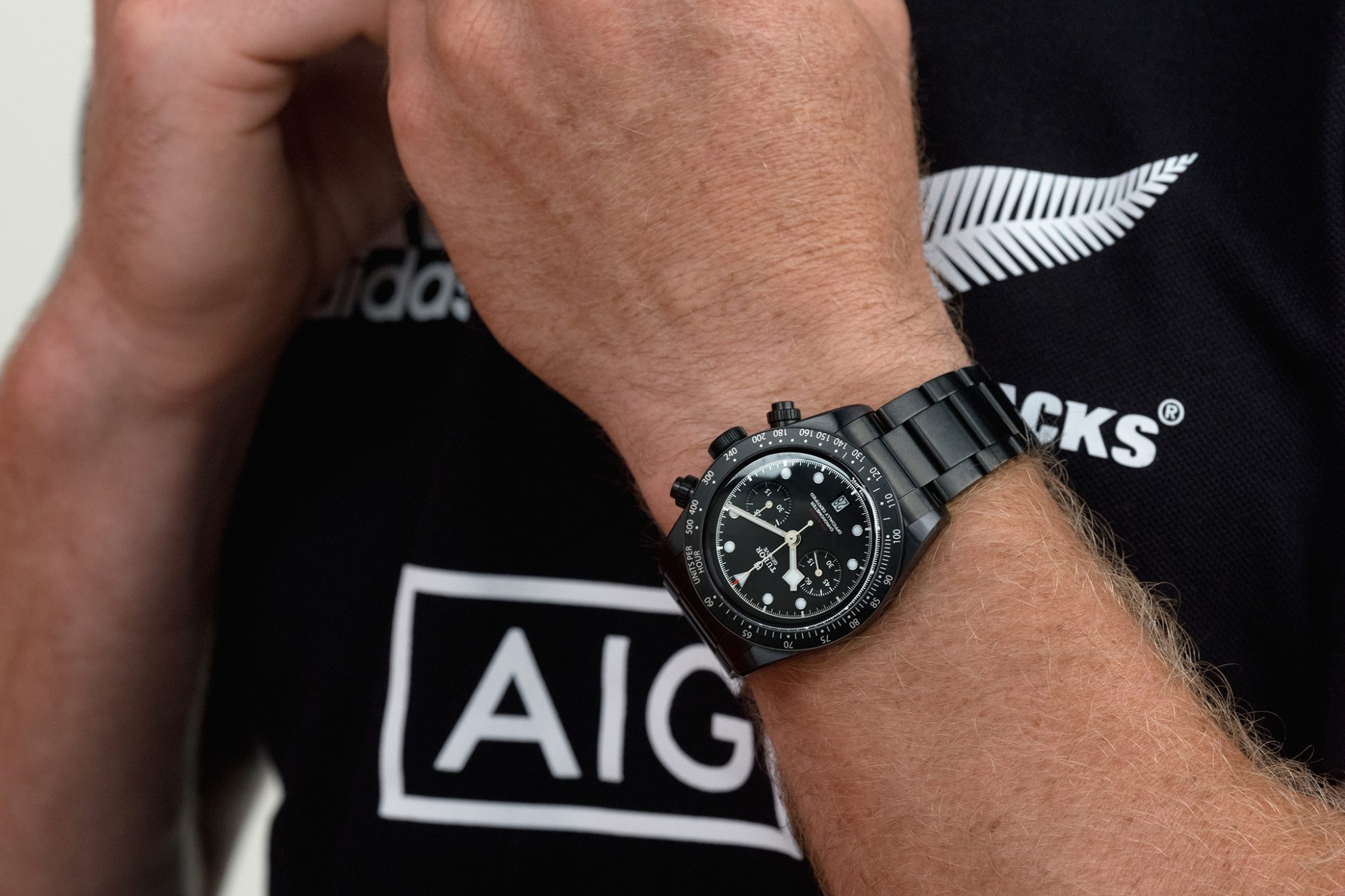 TUDOR Black Bay Chrono Dark on the wrist of All Blacks Rugby Player Beauden Barett. . Article 50 Years Of Tudor Chronographs