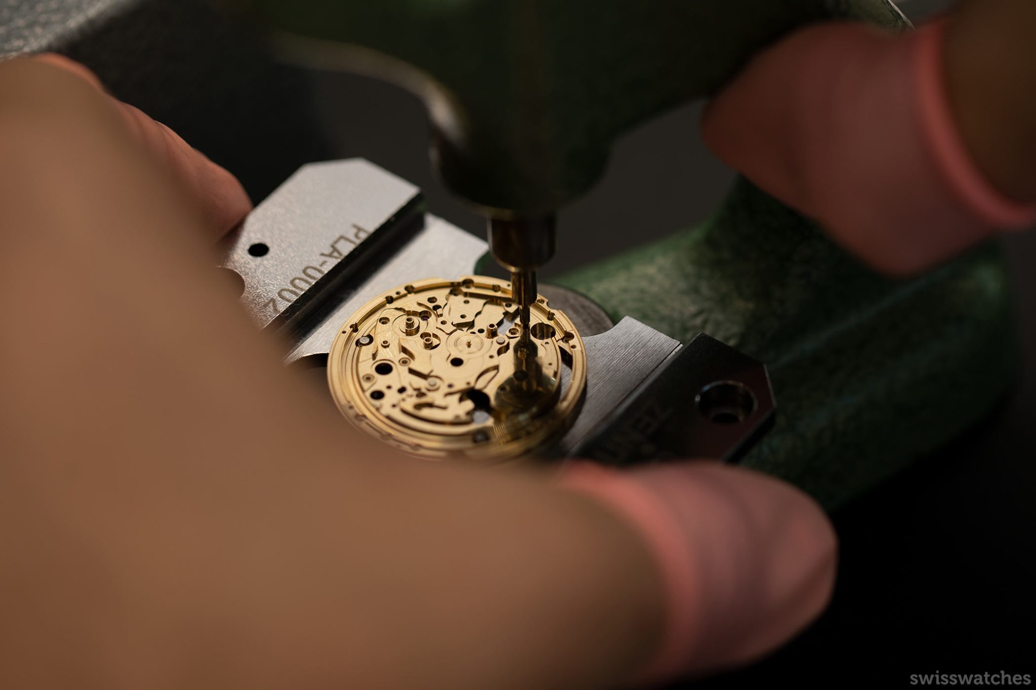 Rubin stones being inserted through a machine with a big needle