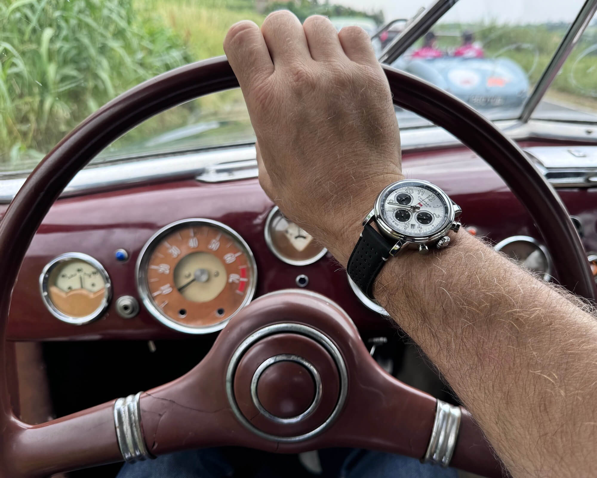 at-the-wheel-of-the-racing-green-fiat-1100-pininfarina-from-1950-with-