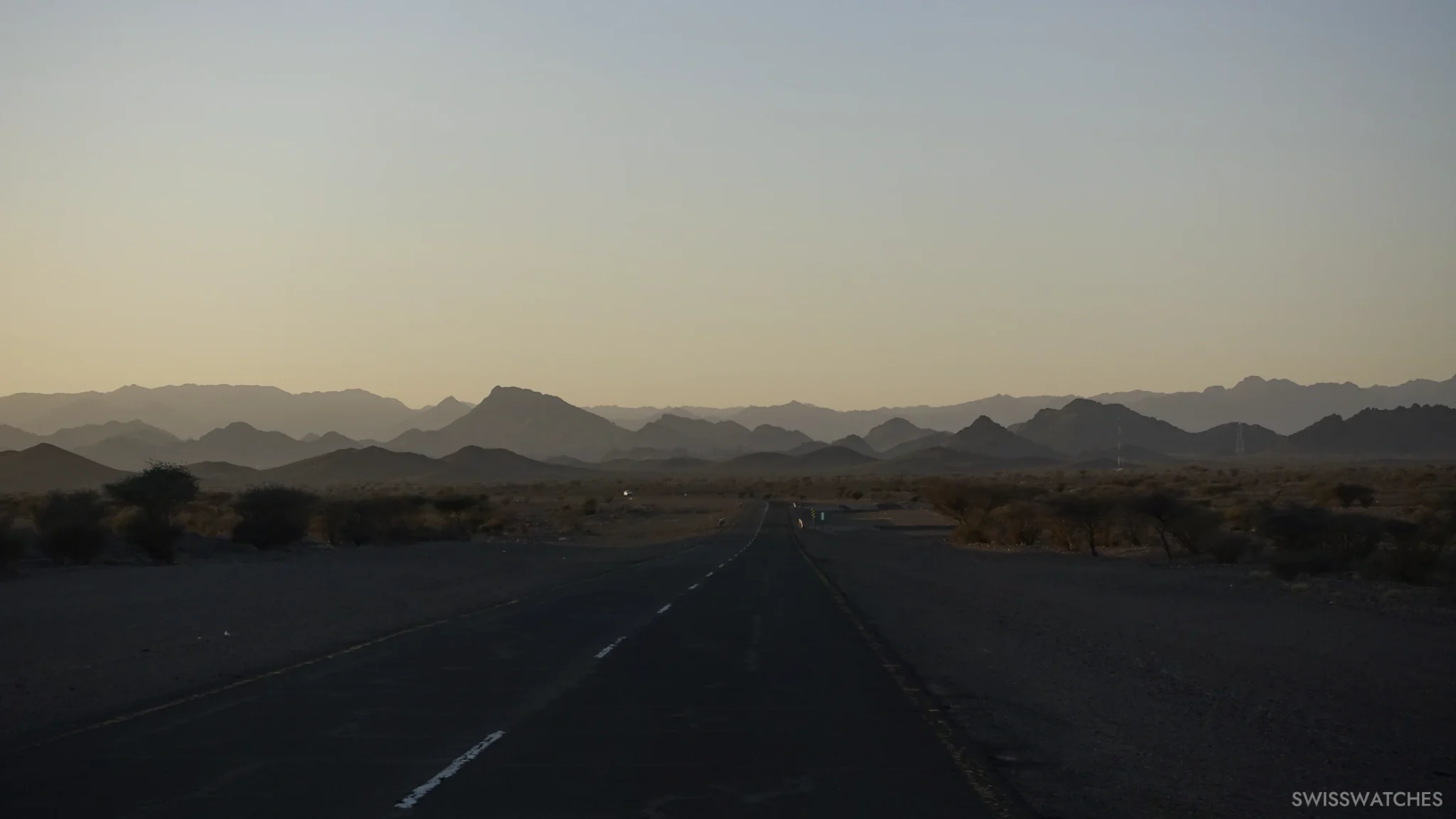 the-setting-sun-and-the-mountain-landscape
