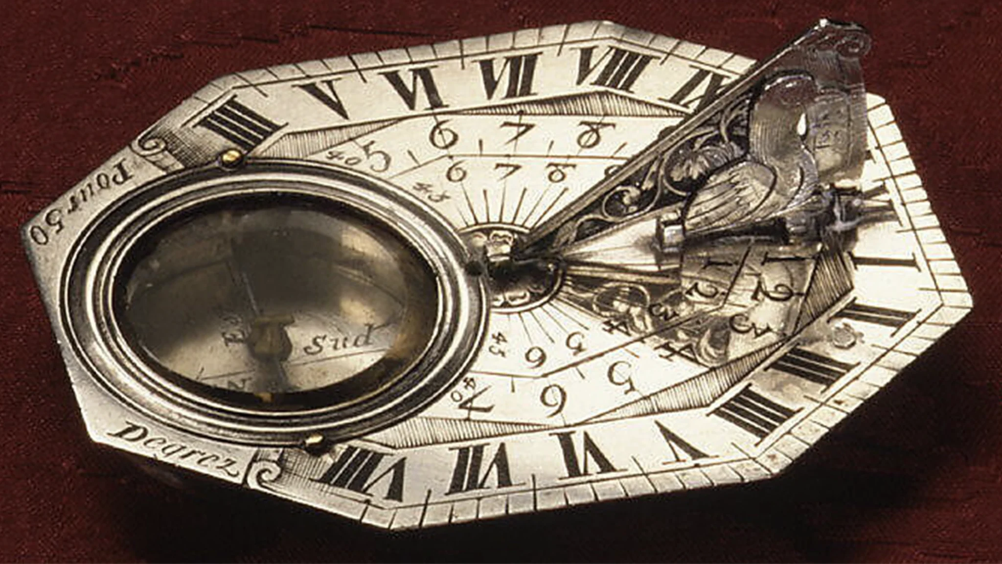 a-silver-horizontal-sundial-with-integrated-compass-before-1681