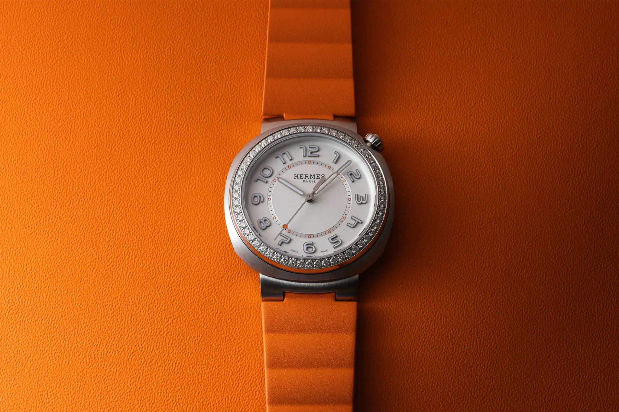 Hermès Cut Watch, featuring a sleek, modern design with a distinctive cut-shaped case, showcasing Swiss craftsmanship and luxurious style for contemporary watch lovers
