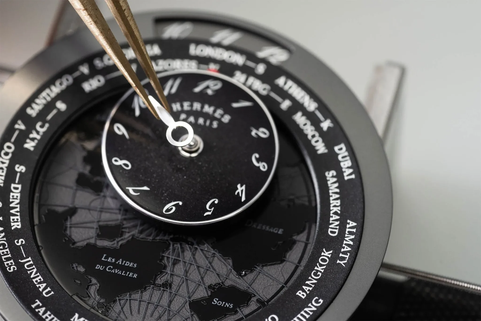 Hermès Le Temps Voyageur, a luxurious timepiece featuring innovative design and Swiss craftsmanship, showcasing a unique world-time function for the modern traveler