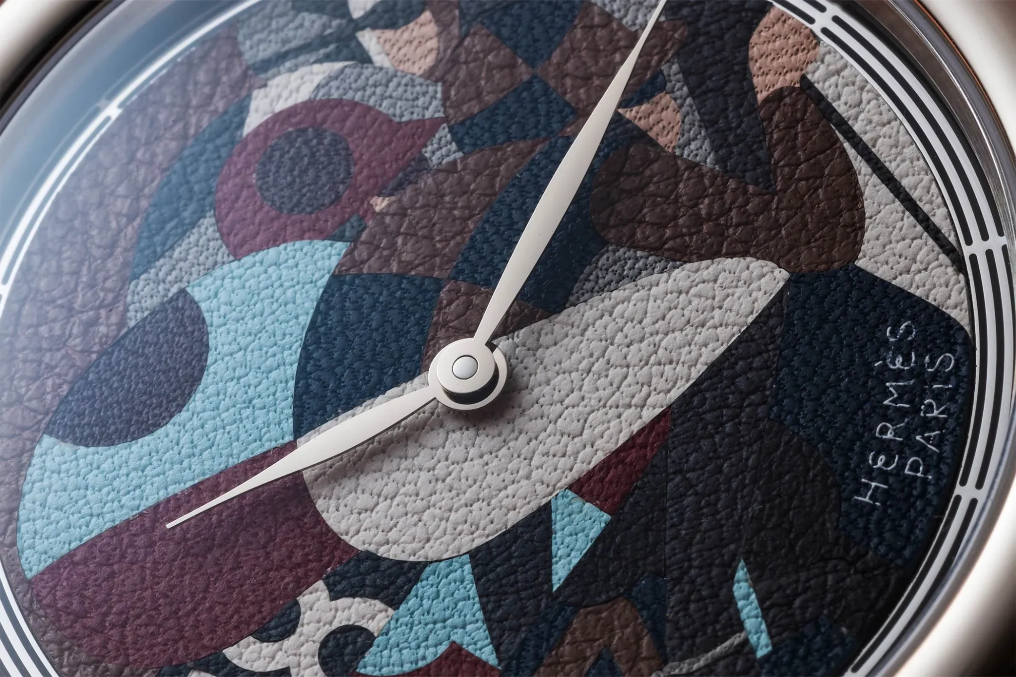 Hermès Watch Manufacture Leather Marquetry, featuring exquisite craftsmanship with luxurious leather marquetry design, showcasing fine artistry and Swiss precision in a sophisticated timepiece