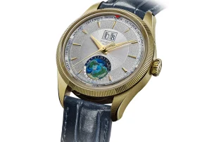 Montblanc 1858 Geosphere Annual Calendar Limited Edition watch in gold case with a textured dial, world time display, and blue leather strap