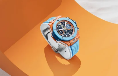 The Hublot Big Bang Unico Summer 2025 in front of an orange background