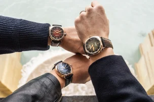 A wristshot of three wrists, including one wearing the Radiomir Annual Calendar Platinumtech during the Panerai Experience.