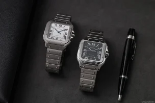 Side-by-side view of the Cartier Santos de Cartier references CRWSSA0089 in titanium and CRWSSA0096 in steel, highlighting their dial and case differences.