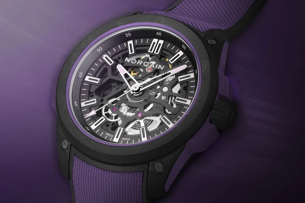 The dialside of the Norqain Wild One Skeleton 42 mm Purple presents itself with purple details.