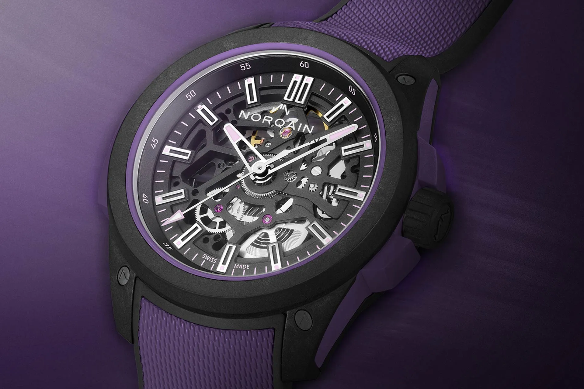 The dialside of the Norqain Wild One Skeleton 42 mm Purple presents itself with purple details.