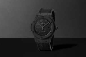 Front view of the Hublot Yohji Yamamoto All Black watch with black case and textured dial.