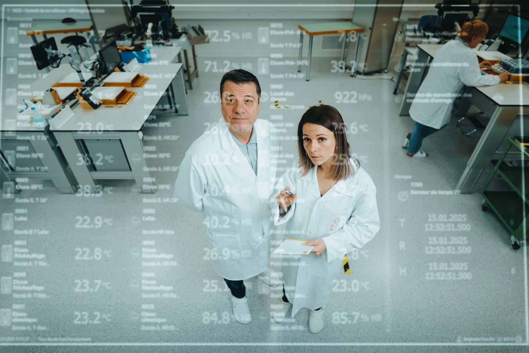 Three people in the COSC laboratory