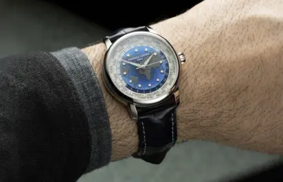 The frederique constant worldtimer on wrist in a front view