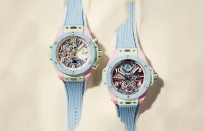 The Big Bang Summer Multi-Colored Ceramic 42 mm and Big Bang Summer Multi-Colored Ceramic 44 mm are lying in the sand; the straps are partially covered.