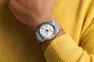 The Tudor Black Bay Pro with a white dial is shown on the wrist.